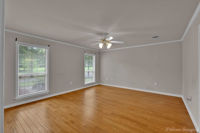 1403 Whispering Pines Dr, Minden, LA 71055 - unfurnished room featuring ceiling fan, baseboards, light wood-type flooring, and crown molding