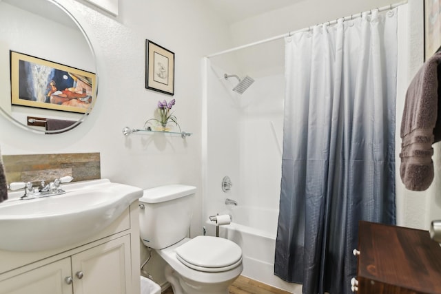 203 Goodson Way, Denton, TX 76207 - bathroom featuring vanity, shower / bath combo, toilet, and wood finished floors