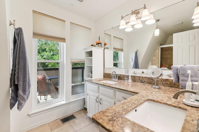 203 Goodson Way, Denton, TX 76207 - bathroom with tile patterned flooring, double vanity, and a shower stall
