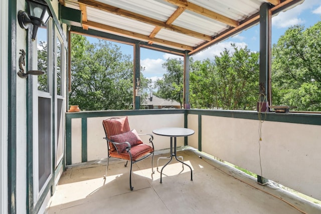 203 Goodson Way, Denton, TX 76207 - sunroom featuring view of scattered trees