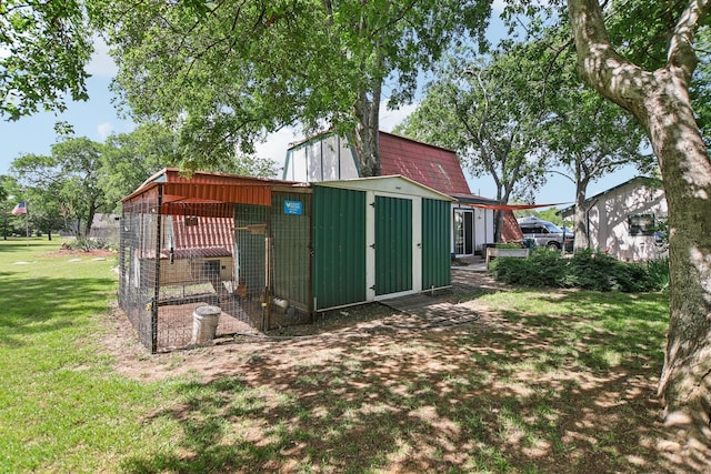 203 Goodson Way, Denton, TX 76207 - view of poultry coop featuring a lawn