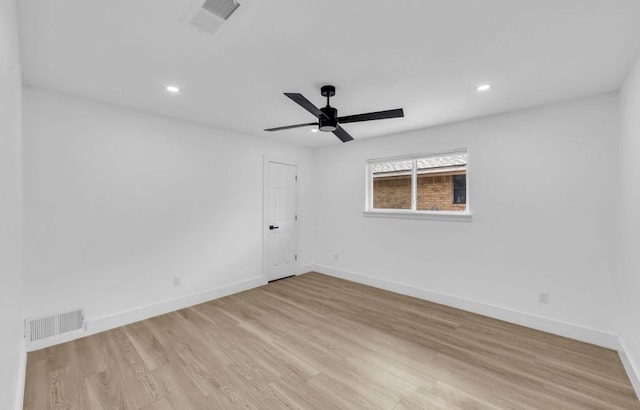 empty room with wood finished floors, baseboards, recessed lighting, and ceiling fan