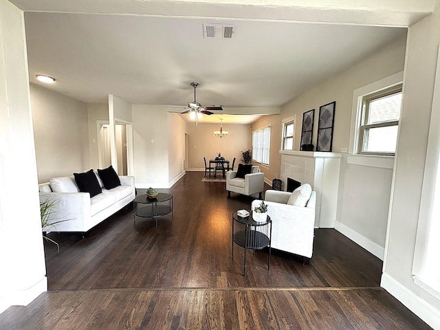 2009 Berwick Ave, Dallas, TX 75203 - living room with wood finished floors, baseboards, and a ceiling fan