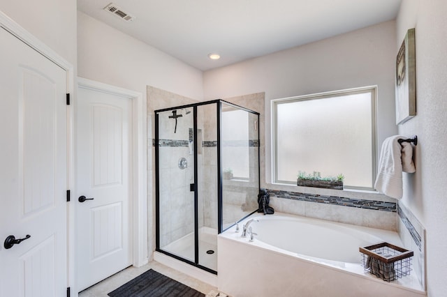 10804 Abbeyglen Ct, Fort Worth, TX 76052 - full bathroom featuring a stall shower and a bath