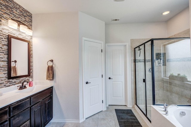 10804 Abbeyglen Ct, Fort Worth, TX 76052 - bathroom with a stall shower, vanity, a bath, baseboards, and tile patterned flooring