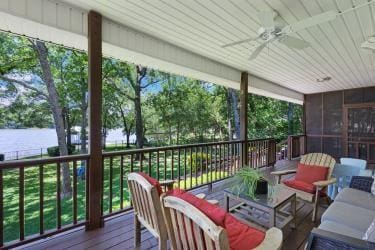 7095 Lance Ln, Eustace, TX 75124 - deck featuring ceiling fan, a water view, and outdoor lounge area