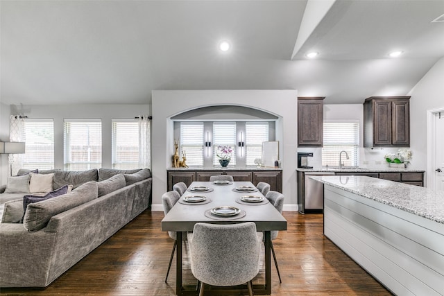 936 Mangrove Dr, Fate, TX 75087 - dining room with dark wood finished floors, recessed lighting, baseboards, and vaulted ceiling