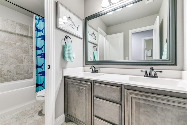 936 Mangrove Dr, Fate, TX 75087 - bathroom with double vanity, shower / bath combo, and toilet