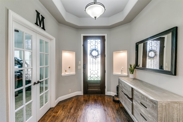 936 Mangrove Dr, Fate, TX 75087 - foyer with french doors, dark wood finished floors, and baseboards
