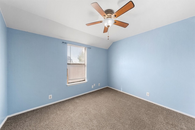 1300 Chapel Downs Rd, Waco, TX 76712 - spare room featuring dark carpet, ceiling fan, baseboards, and lofted ceiling
