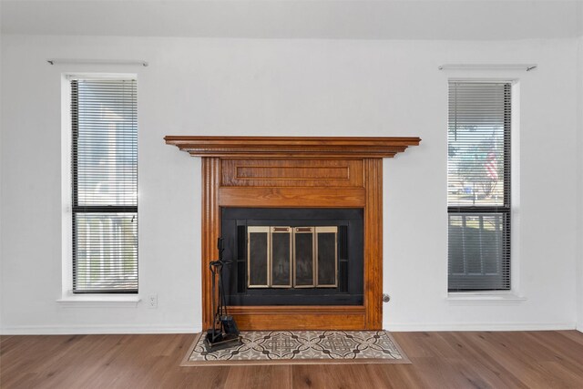 1300 Chapel Downs Rd, Waco, TX 76712 - detailed view of a fireplace with flush hearth and wood finished floors