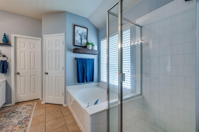 8209 Clear Bay Dr, Mckinney, TX 75072 - full bath featuring a shower stall, a bath, tile patterned floors, and vaulted ceiling