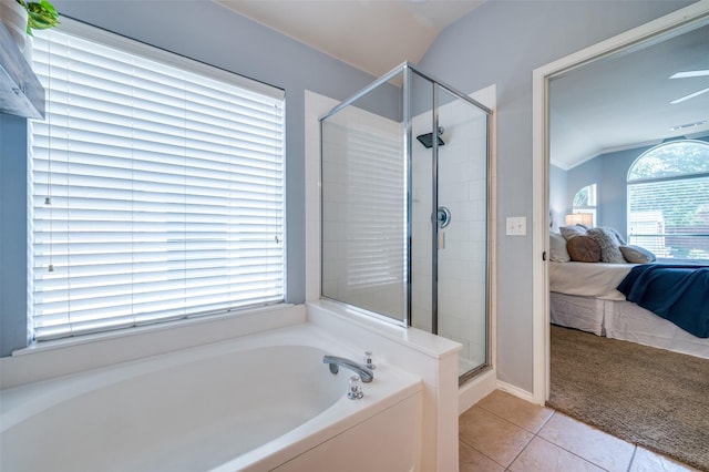 8209 Clear Bay Dr, Mckinney, TX 75072 - ensuite bathroom featuring a stall shower, a bath, tile patterned floors, and vaulted ceiling
