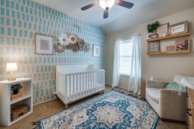 8209 Clear Bay Dr, Mckinney, TX 75072 - carpeted bedroom with a nursery area, wallpapered walls, ceiling fan, and baseboards
