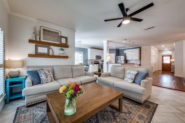 8209 Clear Bay Dr, Mckinney, TX 75072 - living room with crown molding, a ceiling fan, recessed lighting, and baseboards