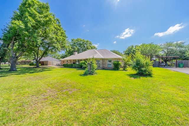 916 Rachelle Dr, Red Oak, TX 75154 - view of yard with a carport and a pergola