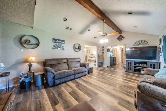 916 Rachelle Dr, Red Oak, TX 75154 - living area featuring a textured ceiling, wood finished floors, a ceiling fan, and baseboards