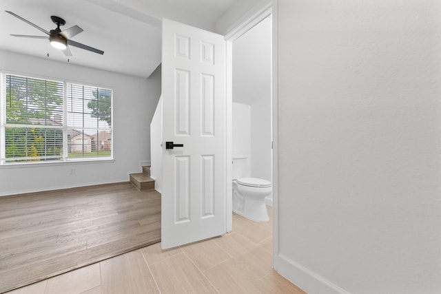 7919 Maiden Ln, Frisco, TX 75035 - bathroom featuring toilet, baseboards, ceiling fan, and wood finished floors