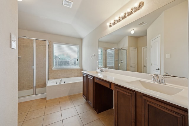 1403 Illinois Ave, Lancaster, TX 75134 - full bath featuring a bath, a shower stall, double vanity, and tile patterned flooring