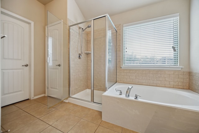 1403 Illinois Ave, Lancaster, TX 75134 - full bath featuring a stall shower, a garden tub, and tile patterned flooring
