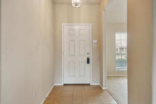 1403 Illinois Ave, Lancaster, TX 75134 - foyer with light tile patterned floors and baseboards
