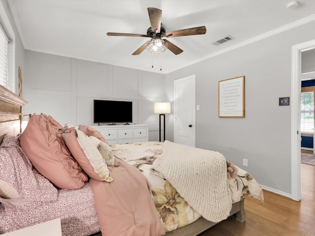 616 Stoneybrook Dr, Wylie, TX 75098 - bedroom featuring light wood finished floors, ceiling fan, ornamental molding, and baseboards