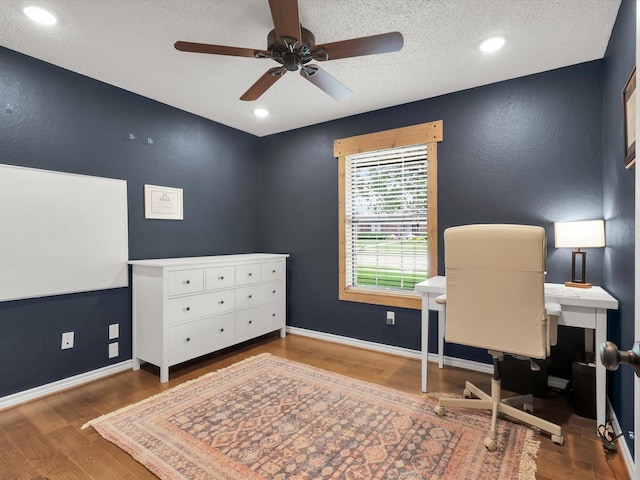 616 Stoneybrook Dr, Wylie, TX 75098 - home office featuring wood finished floors, ceiling fan, a textured ceiling, baseboards, and a textured wall