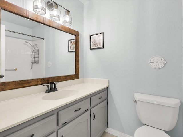 616 Stoneybrook Dr, Wylie, TX 75098 - full bathroom with vanity, toilet, a shower, and baseboards