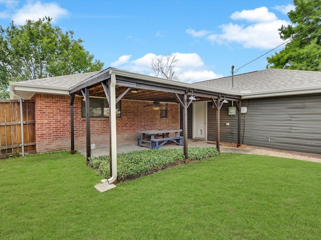 616 Stoneybrook Dr, Wylie, TX 75098 - rear view of house featuring ceiling fan, a patio area, a shingled roof, and brick siding