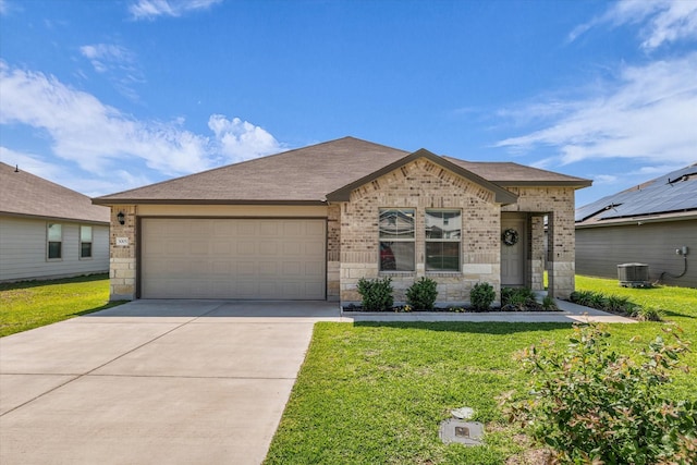 3005 Sherco Rd, Waco, TX 76655 - view of front of house featuring central AC unit, brick siding, an attached garage, driveway, and a front yard