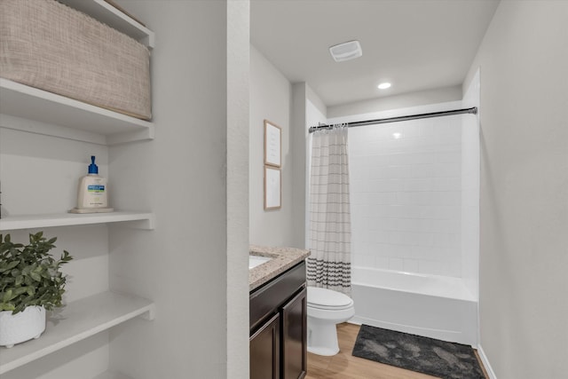 3005 Sherco Rd, Waco, TX 76655 - full bath with wood finished floors, toilet, recessed lighting, shower / tub combo with curtain, and vanity