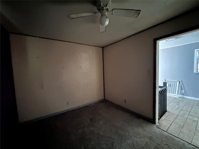 4320 Comanche Dr, May, TX 76857 - carpeted empty room with baseboards and a ceiling fan