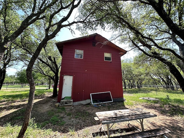 4320 Comanche Dr, May, TX 76857 - view of outbuilding with fence and an outdoor structure