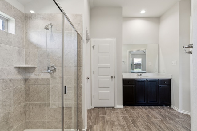 3006 Genevieve Ln, Royse City, TX 75189 - bathroom with a shower stall, baseboards, healthy amount of natural light, and recessed lighting