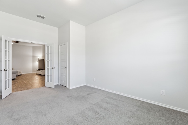 3006 Genevieve Ln, Royse City, TX 75189 - unfurnished bedroom featuring french doors, carpet, and baseboards
