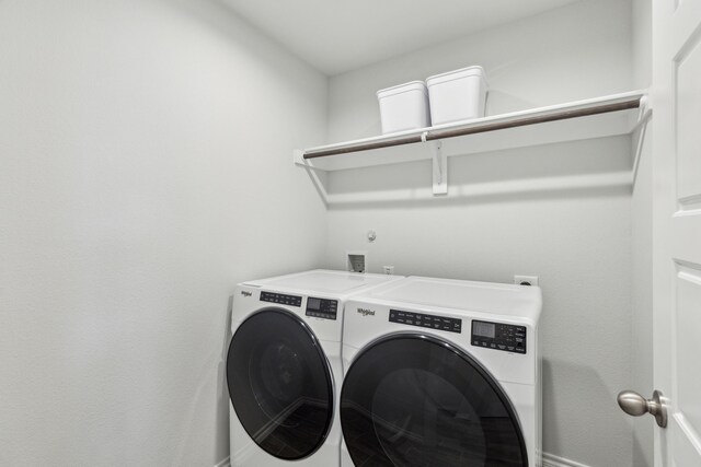 3006 Genevieve Ln, Royse City, TX 75189 - laundry area with separate washer and dryer and baseboards