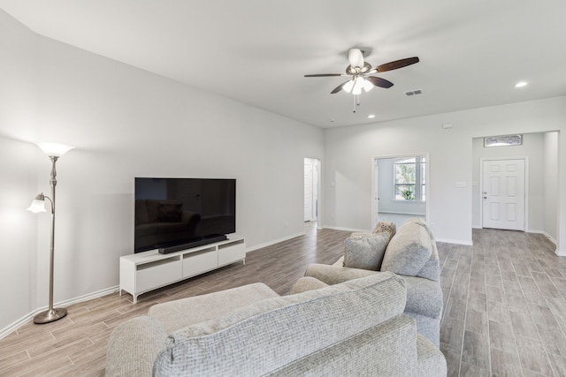 3006 Genevieve Ln, Royse City, TX 75189 - living area featuring light wood-style flooring, a ceiling fan, recessed lighting, and baseboards
