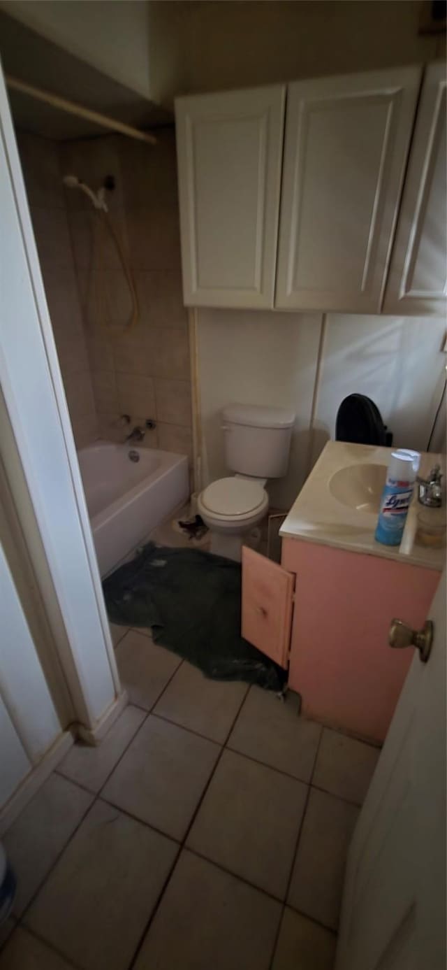 2017 Village Way, Dallas, TX 75216 - bathroom featuring tile patterned flooring, toilet, vanity, and  shower combination