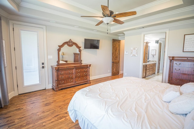 44 Mirror Lakes Ct, Gunter, TX 75058 - bedroom with a tray ceiling, light wood-style flooring, ornamental molding, a ceiling fan, and ensuite bath