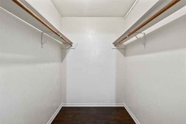 444 Lindenwood Ln W, Hewitt, TX 76643 - walk in closet featuring wood finished floors