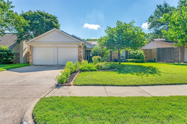 3604 Windsong Ln, Bedford, TX 76021 - view of front of house featuring brick siding, a garage, and driveway
