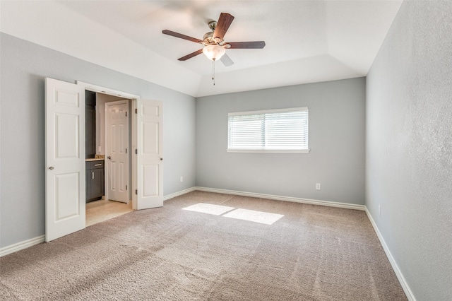 3604 Windsong Ln, Bedford, TX 76021 - unfurnished bedroom featuring light carpet, a raised ceiling, and baseboards