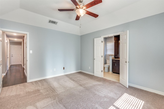 3604 Windsong Ln, Bedford, TX 76021 - unfurnished bedroom featuring carpet flooring, ensuite bath, baseboards, and vaulted ceiling