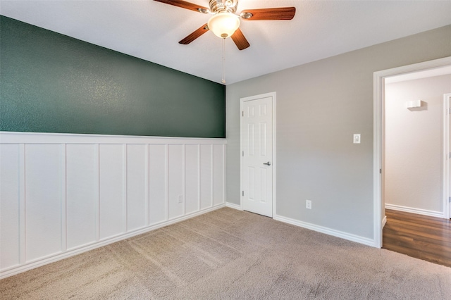 3604 Windsong Ln, Bedford, TX 76021 - carpeted empty room with ceiling fan, wainscoting, and baseboards