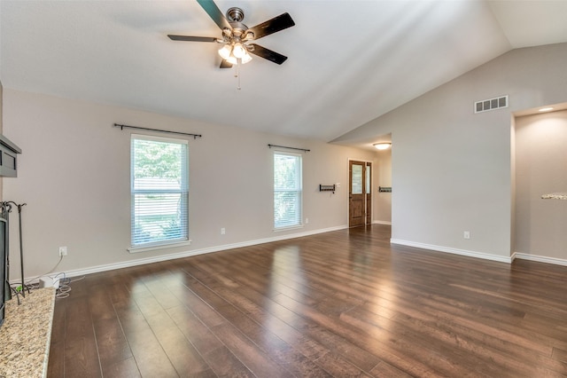 3604 Windsong Ln, Bedford, TX 76021 - unfurnished living room featuring lofted ceiling, ceiling fan, plenty of natural light, and dark wood finished floors