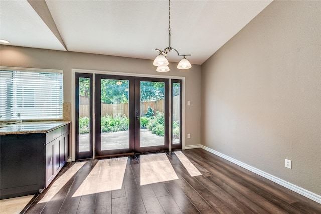 3604 Windsong Ln, Bedford, TX 76021 - doorway featuring french doors, baseboards, dark wood finished floors, and a chandelier