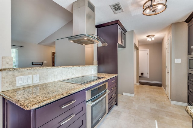 3604 Windsong Ln, Bedford, TX 76021 - kitchen featuring appliances with stainless steel finishes, exhaust hood, light stone countertops, and baseboards