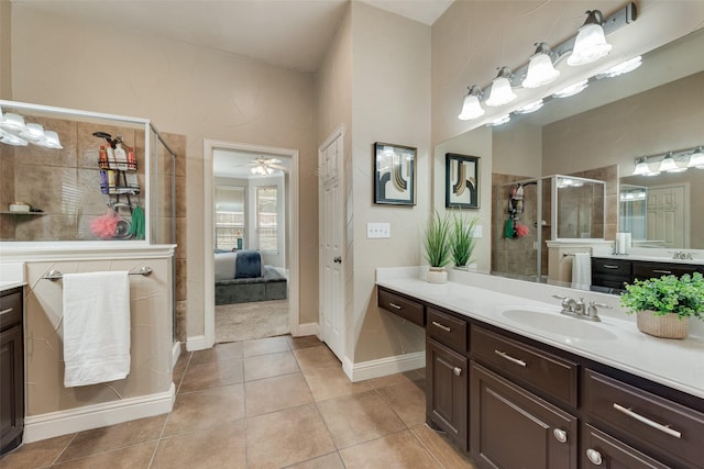 15606 Fox Meadow Ln, Frisco, TX 75035 - full bath with a stall shower, tile patterned floors, and vanity