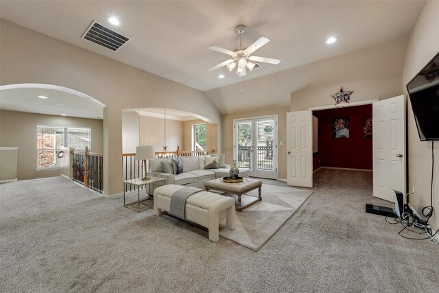 15606 Fox Meadow Ln, Frisco, TX 75035 - living room with carpet floors, arched walkways, a ceiling fan, recessed lighting, and baseboards