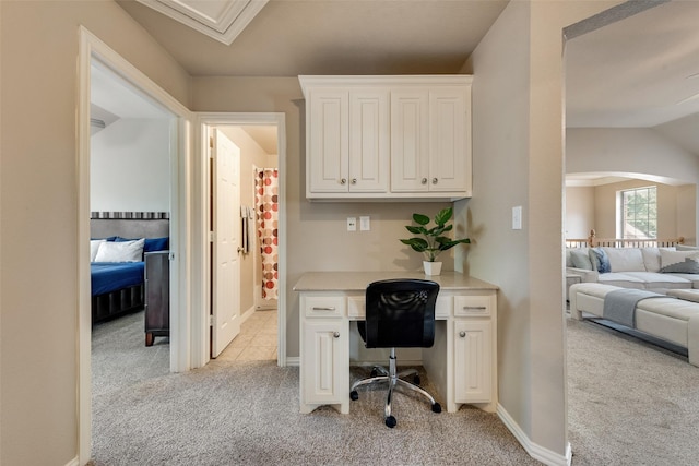 15606 Fox Meadow Ln, Frisco, TX 75035 - office space with light colored carpet, arched walkways, baseboards, and built in study area